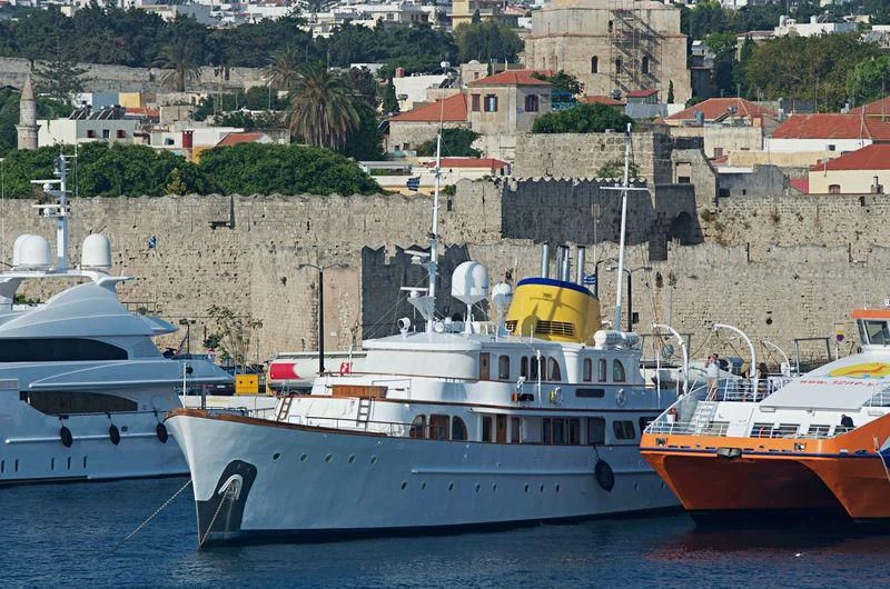 a group of boats in a harbor aboard HASABI II Yacht for Sale
