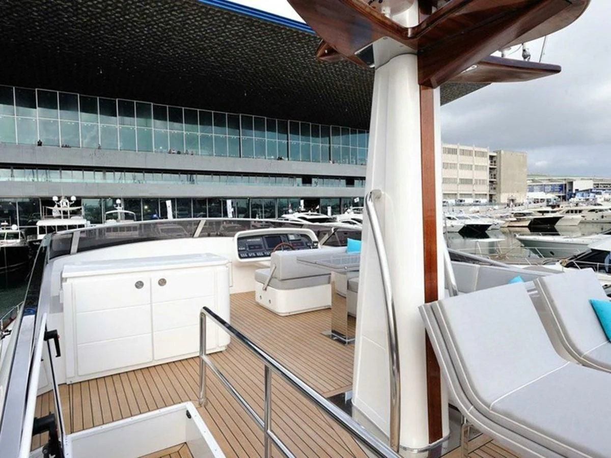 a balcony with a view of a city aboard AUSTIN PARKER - 72 FLY Yacht for Sale