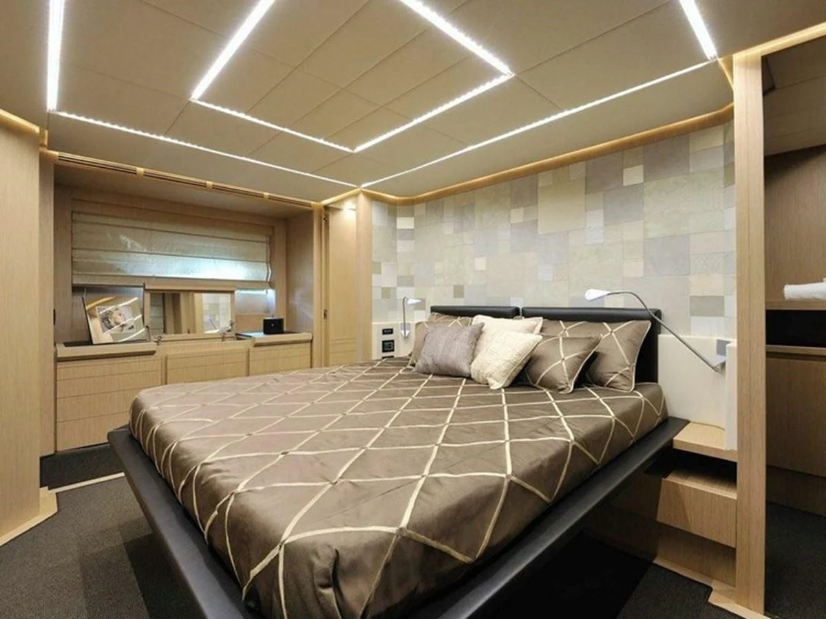 a bed in a room aboard AUSTIN PARKER - 72 FLY Yacht for Sale