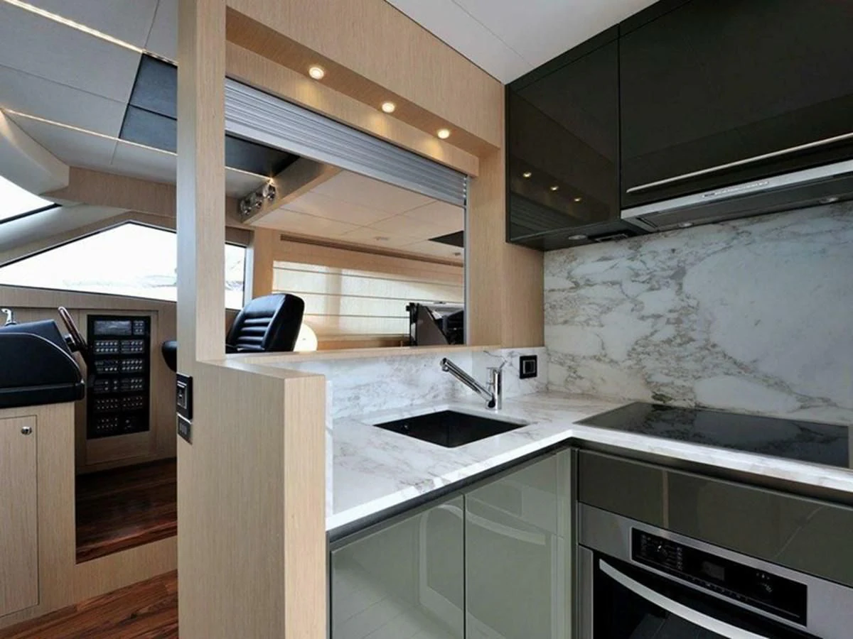 a kitchen with a large oven aboard AUSTIN PARKER - 72 FLY Yacht for Sale