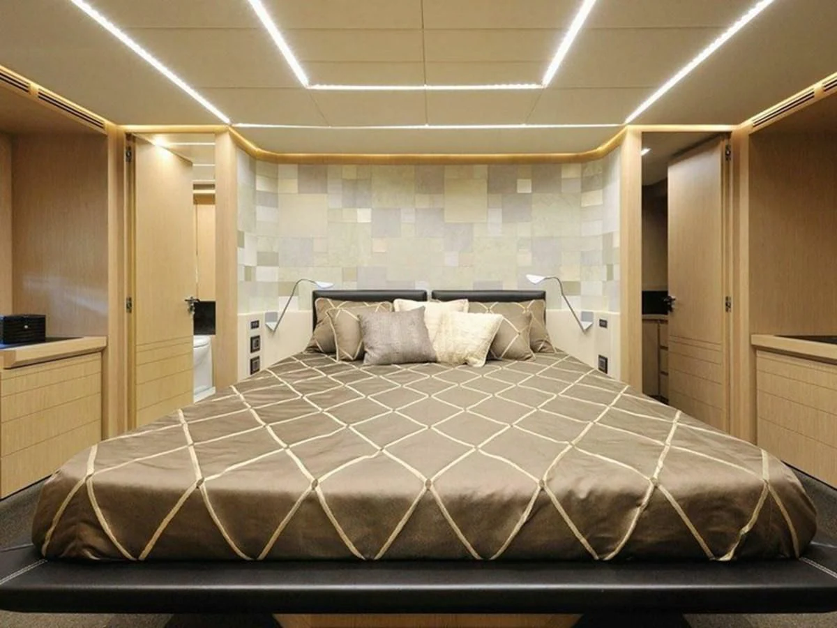 a bed in a room aboard AUSTIN PARKER - 72 FLY Yacht for Sale