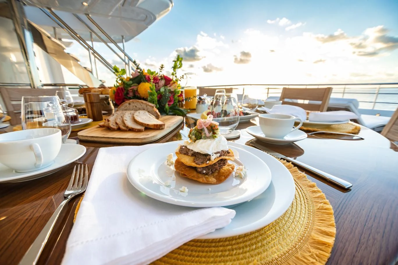 a table with food on it aboard NEENAH Yacht for Charter