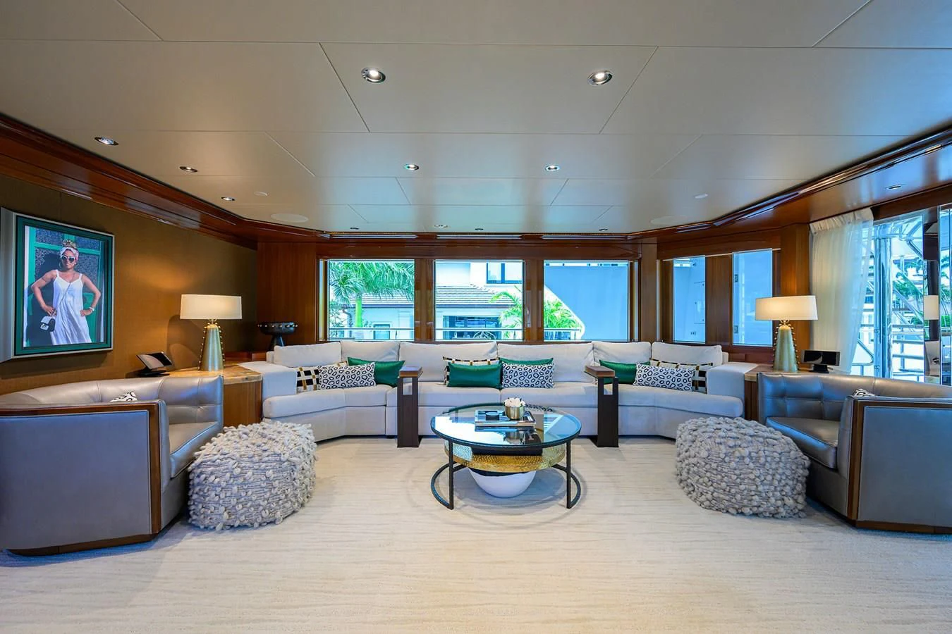 a living room with a large screen aboard NEENAH Yacht for Charter