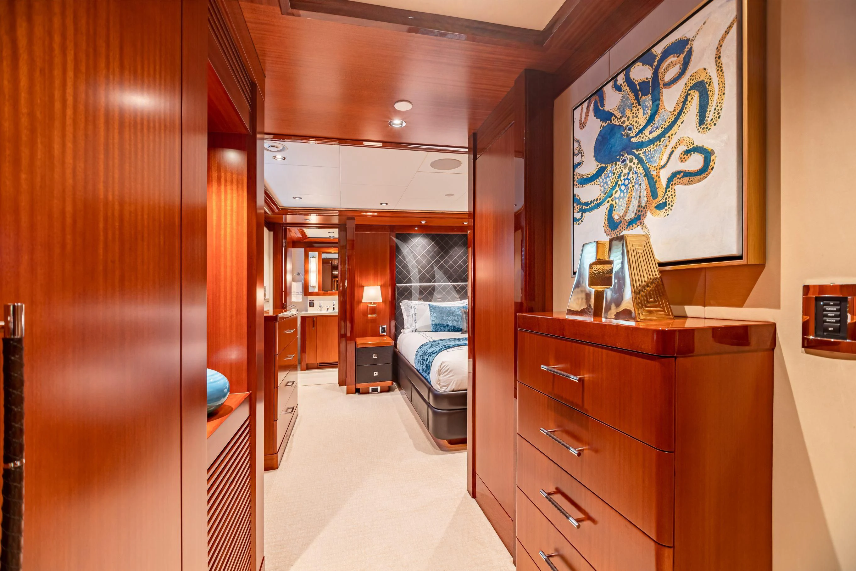 a room with a bed and a desk aboard NEENAH Yacht for Charter