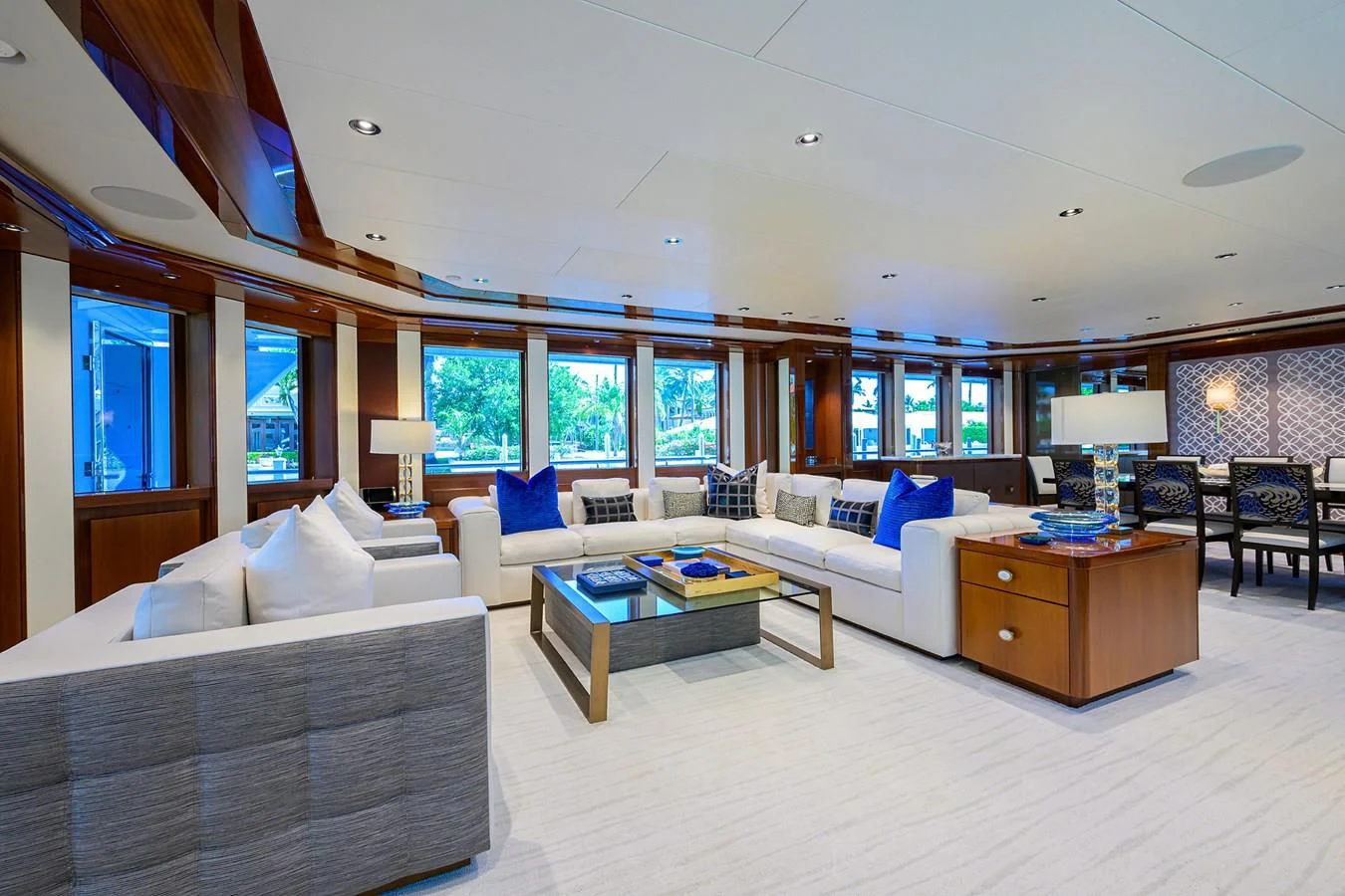 a large living room with a large window aboard NEENAH Yacht for Charter