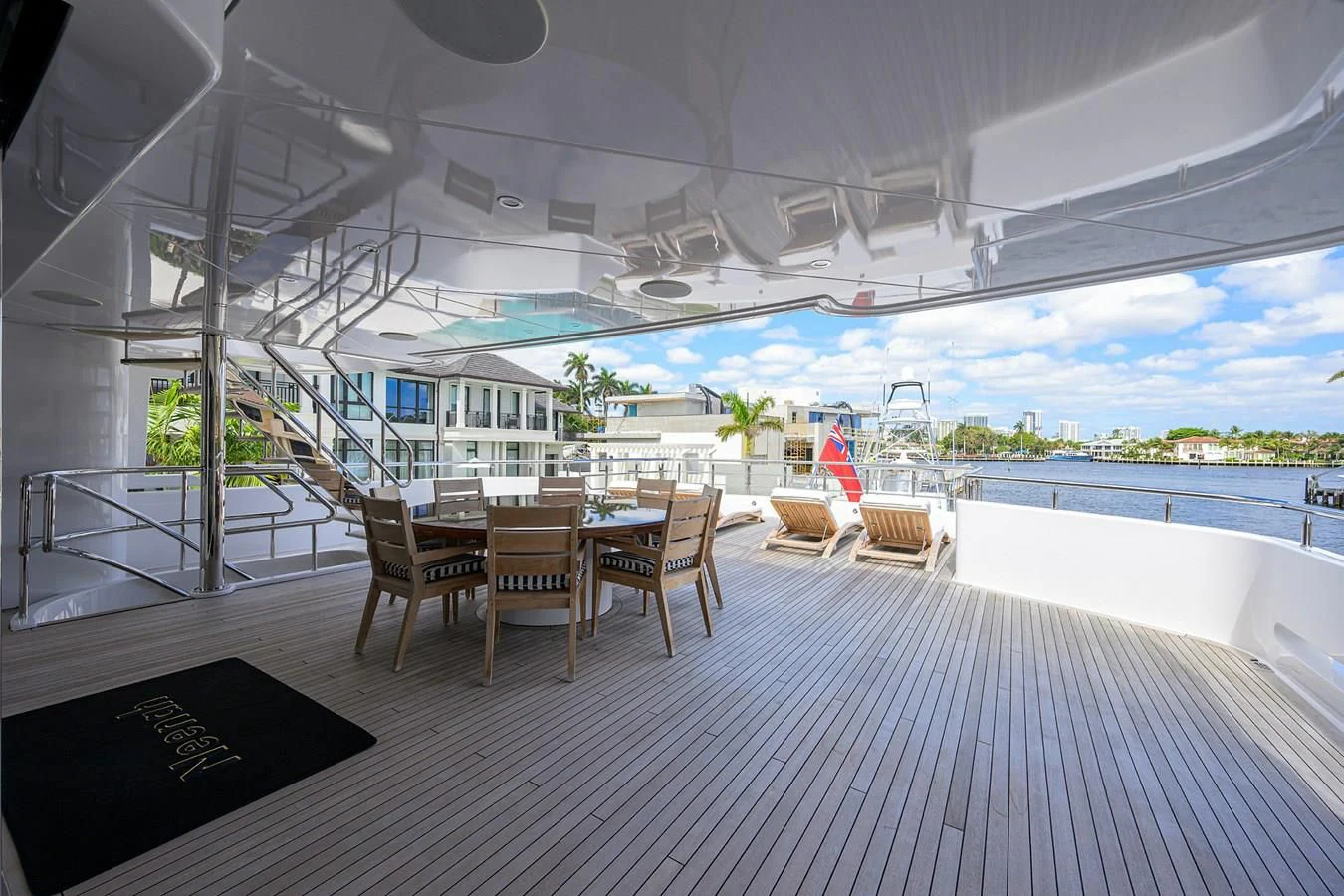 a room with a table and chairs aboard NEENAH Yacht for Charter