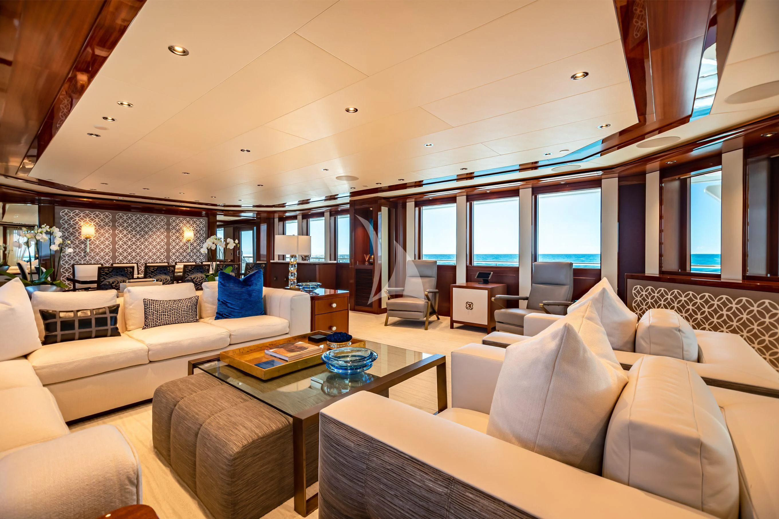 a living room with a large window aboard NEENAH Yacht for Charter