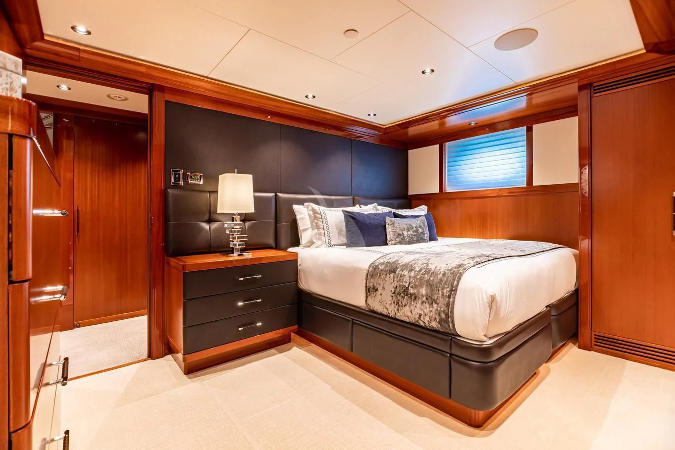 a bed in a room aboard NEENAH Yacht for Charter