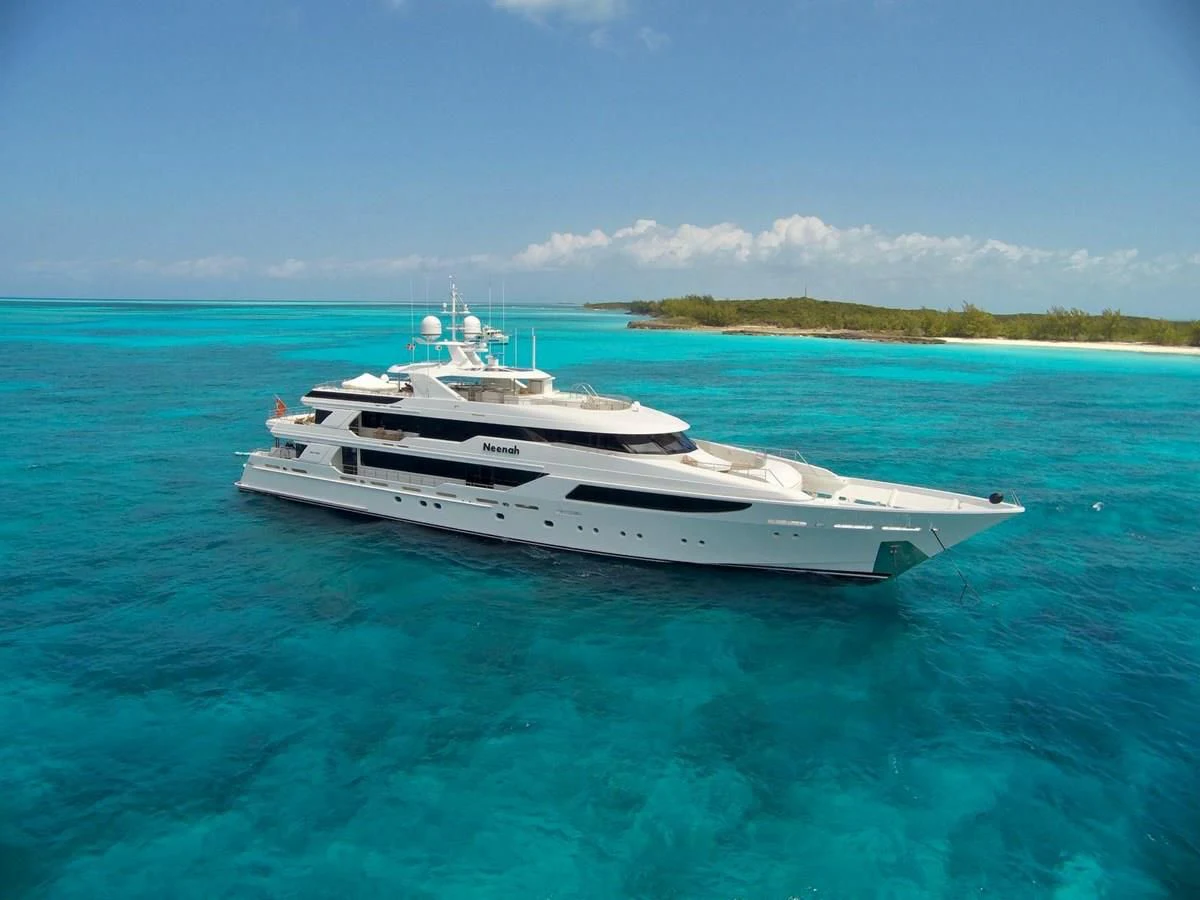 a white yacht in the water aboard NEENAH Yacht for Charter