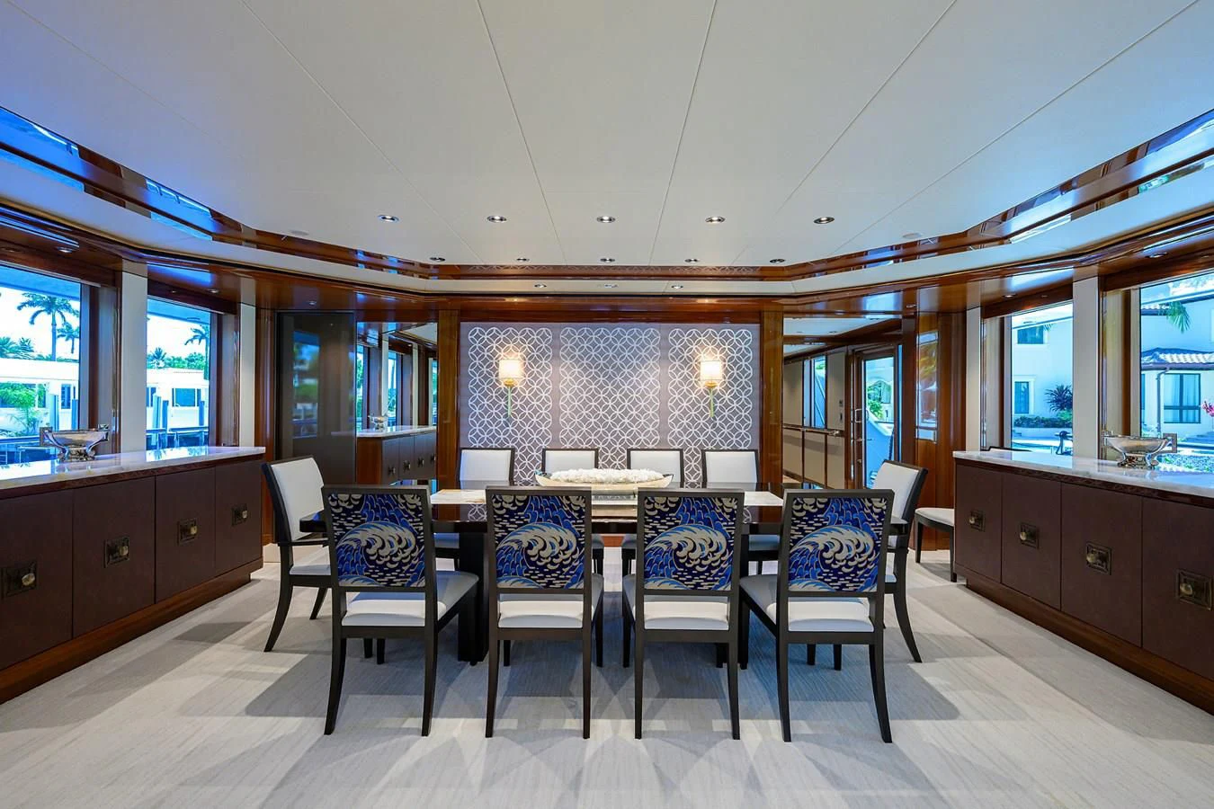 a room with a table chairs and cabinets aboard NEENAH Yacht for Charter