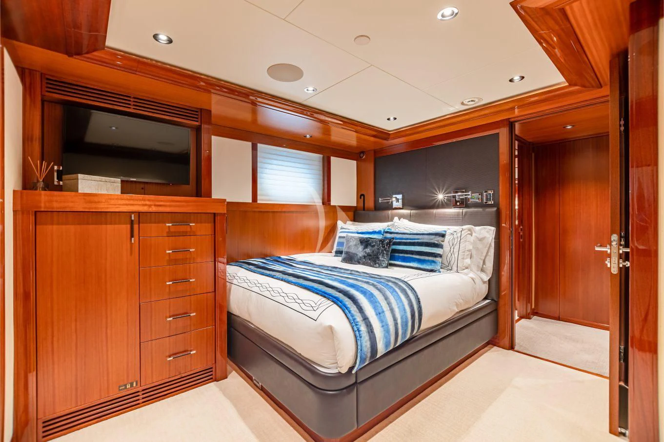 a bed in a room aboard NEENAH Yacht for Charter