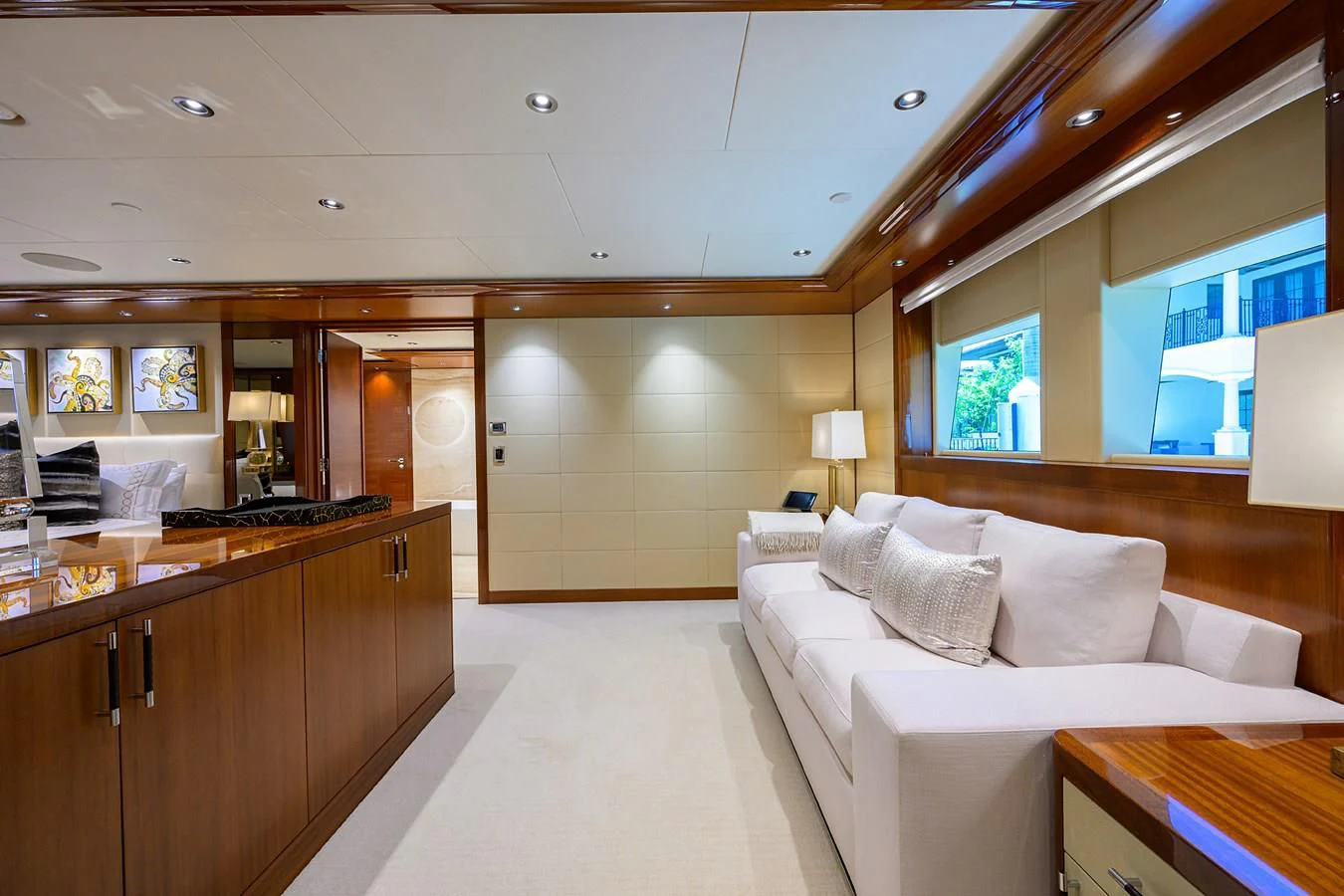 a large room with a bed and a desk aboard NEENAH Yacht for Charter