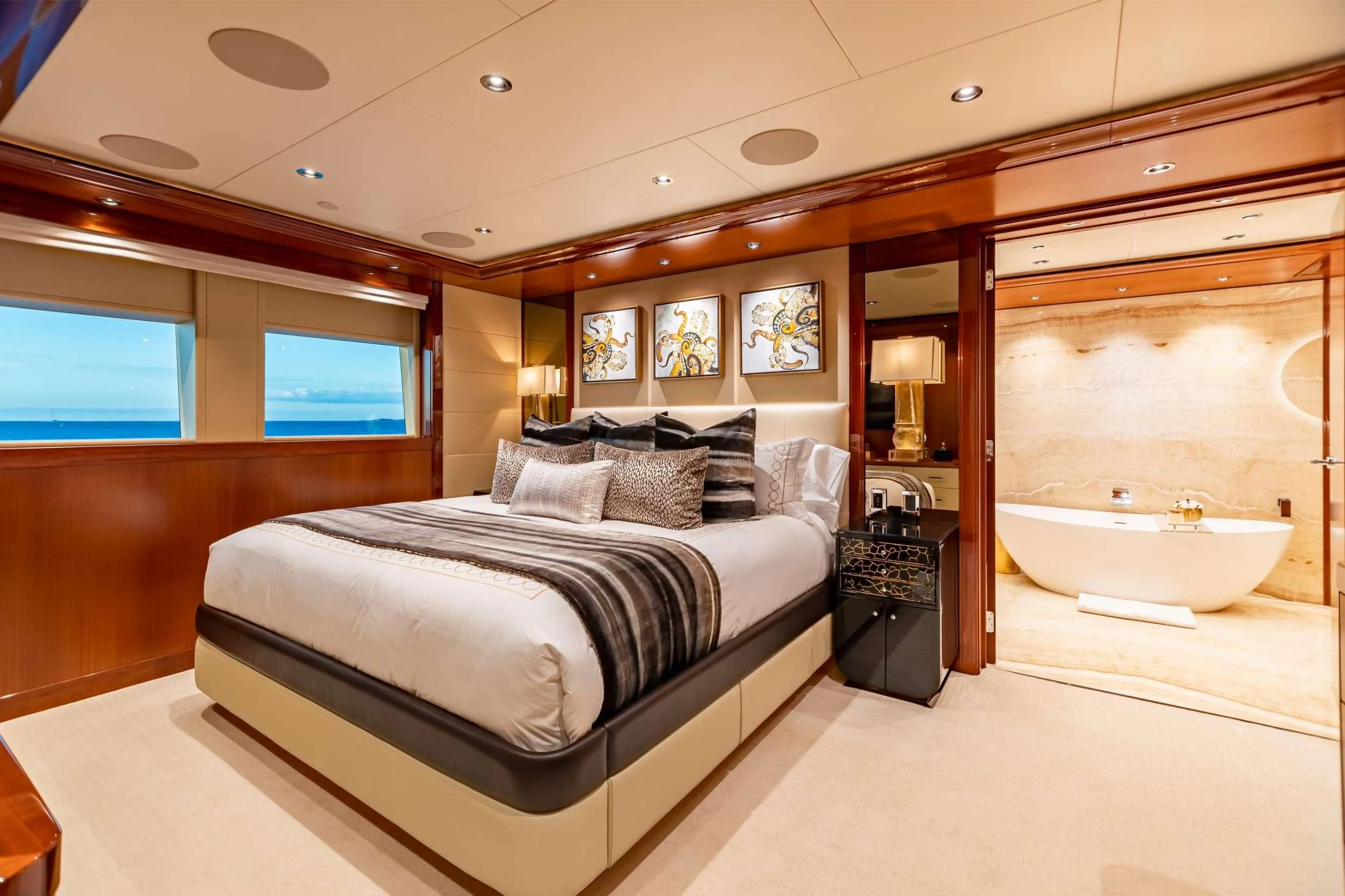 a bedroom with a large bed aboard NEENAH Yacht for Charter