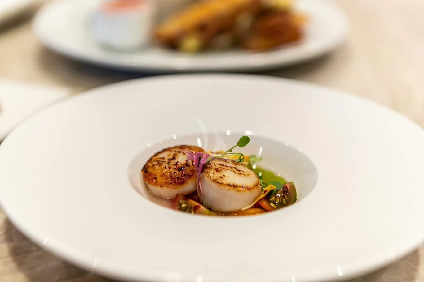 a plate of food aboard NEENAH Yacht for Charter