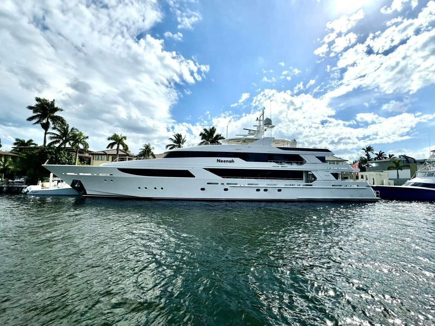 a white yacht in the water aboard NEENAH Yacht for Charter