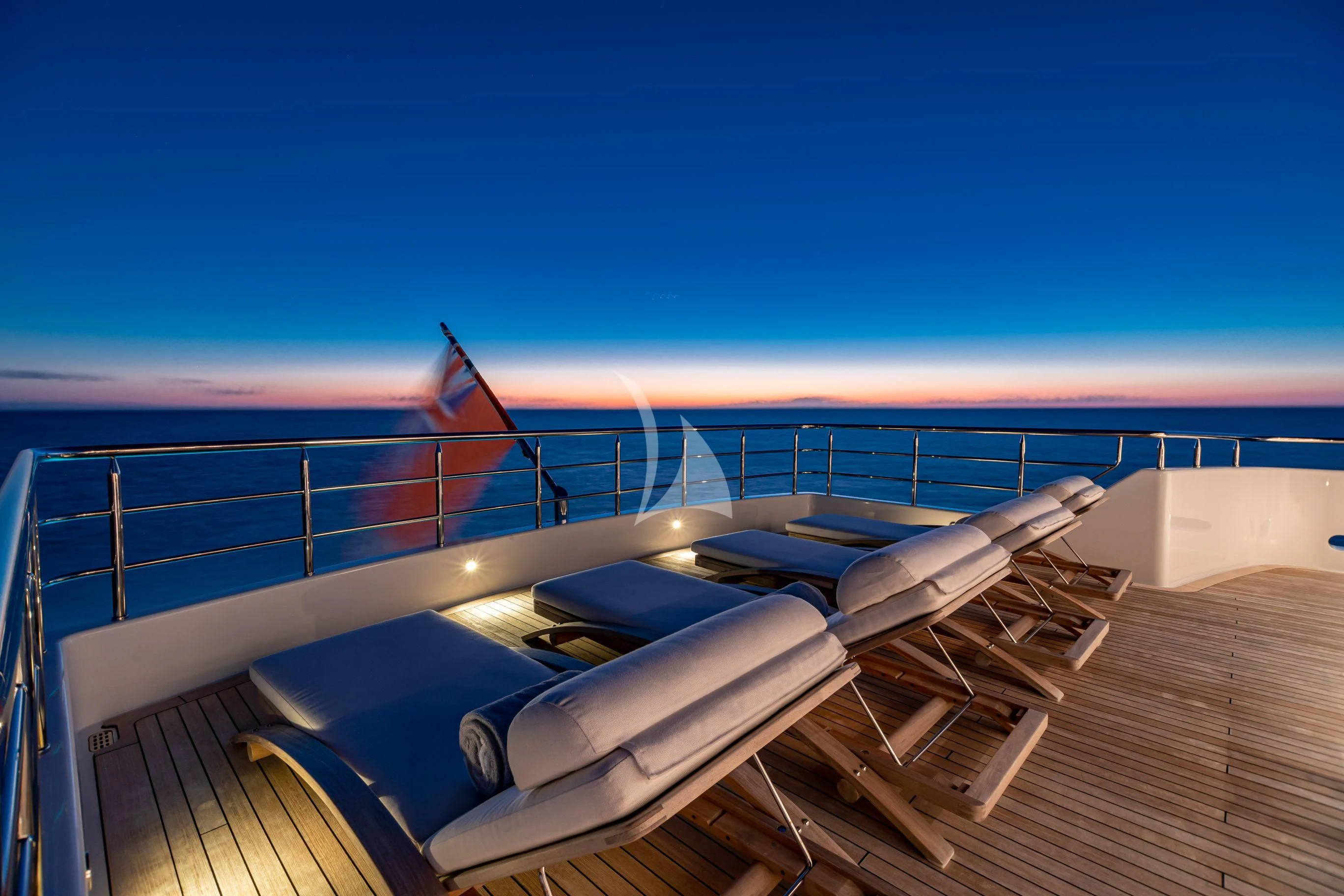 a boat on a deck aboard NEENAH Yacht for Charter