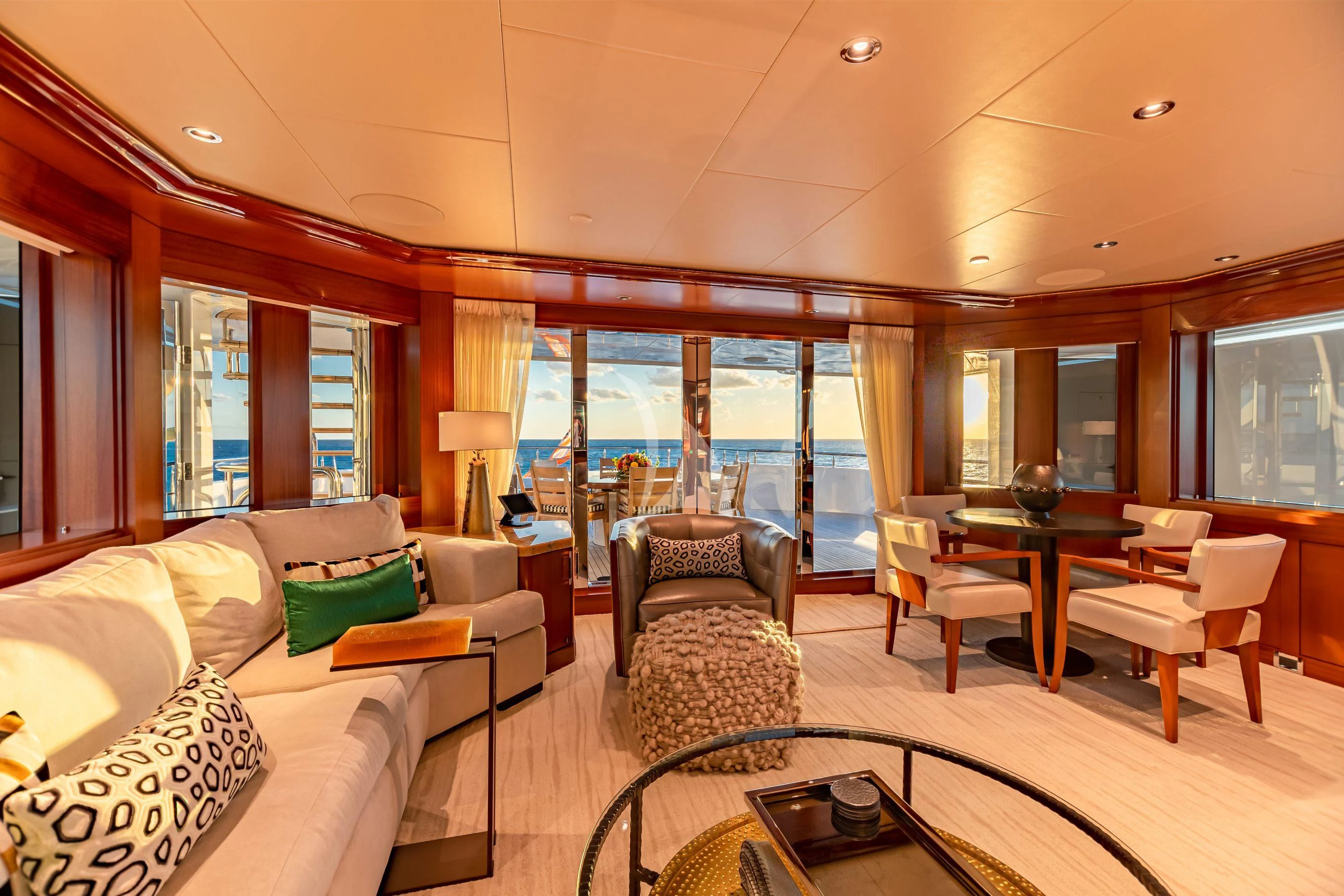 a living room with a large window aboard NEENAH Yacht for Charter
