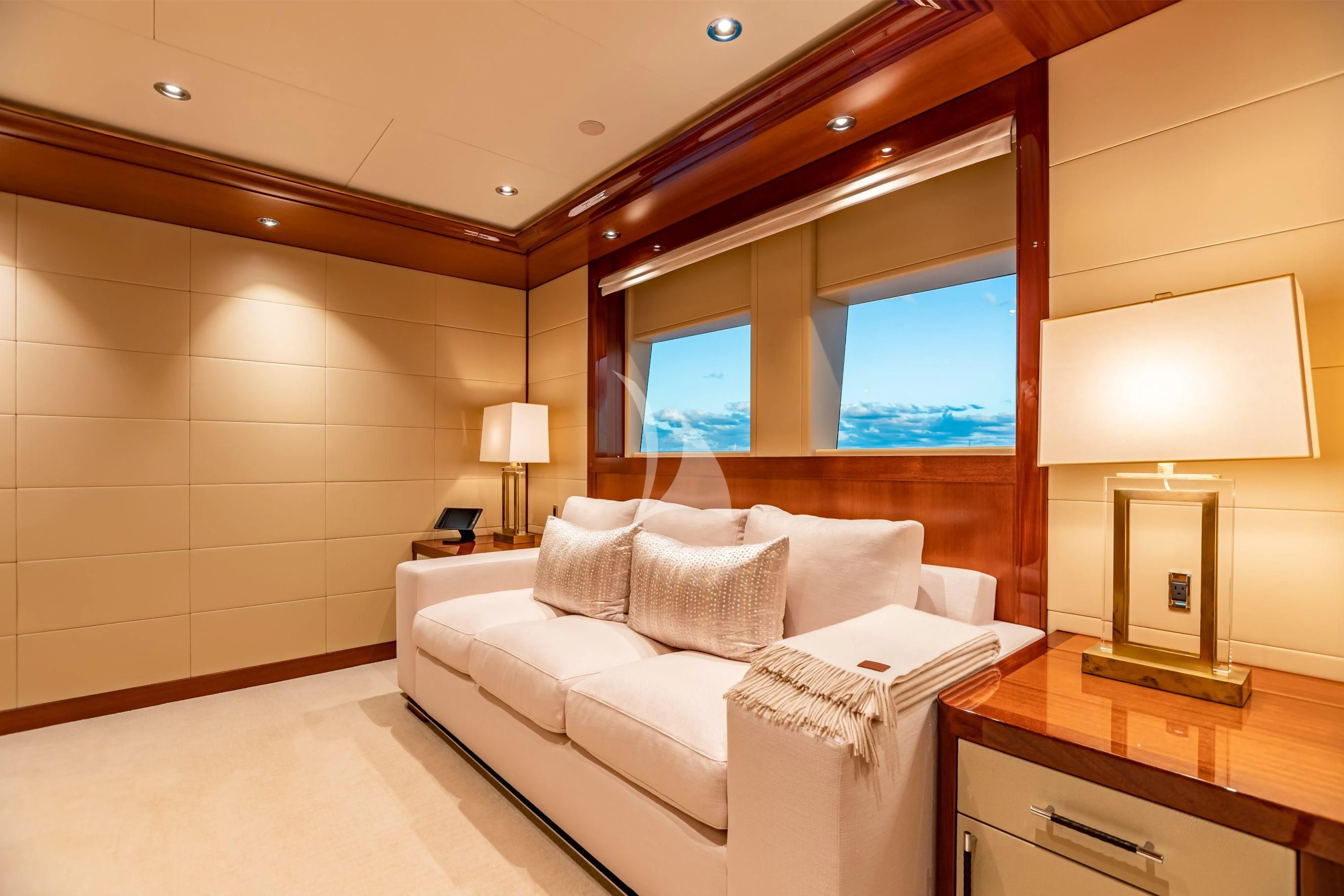 a room with a bed and a desk aboard NEENAH Yacht for Charter