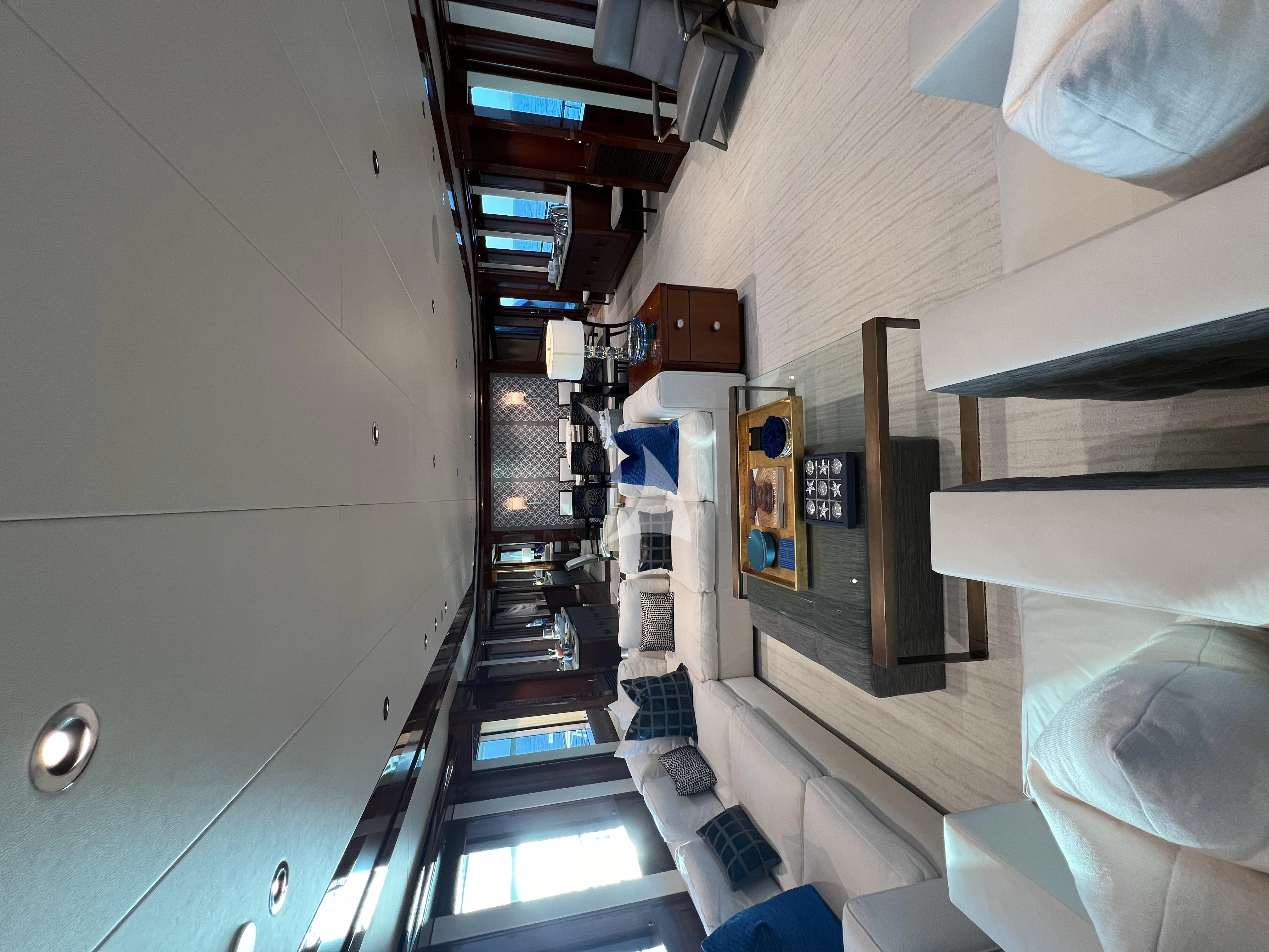 a room with a staircase and a window aboard NEENAH Yacht for Charter