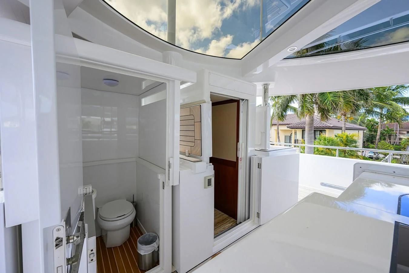 a bathroom with a tub and toilet aboard NEENAH Yacht for Charter