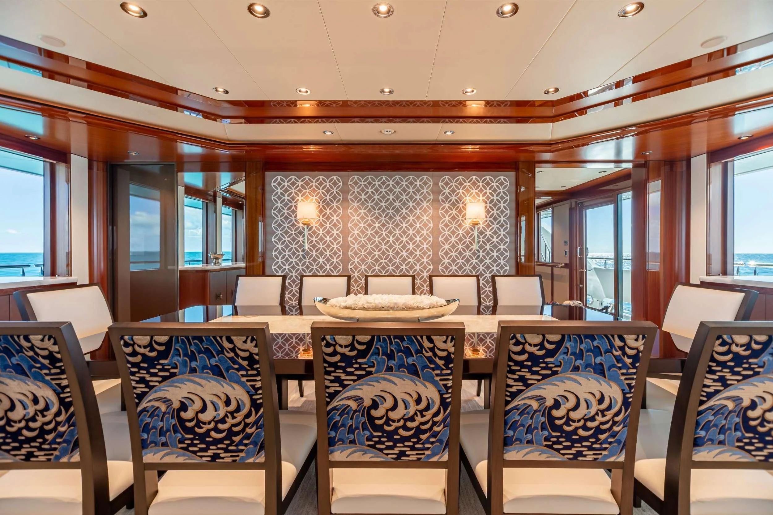 a room with chairs and tables aboard NEENAH Yacht for Charter