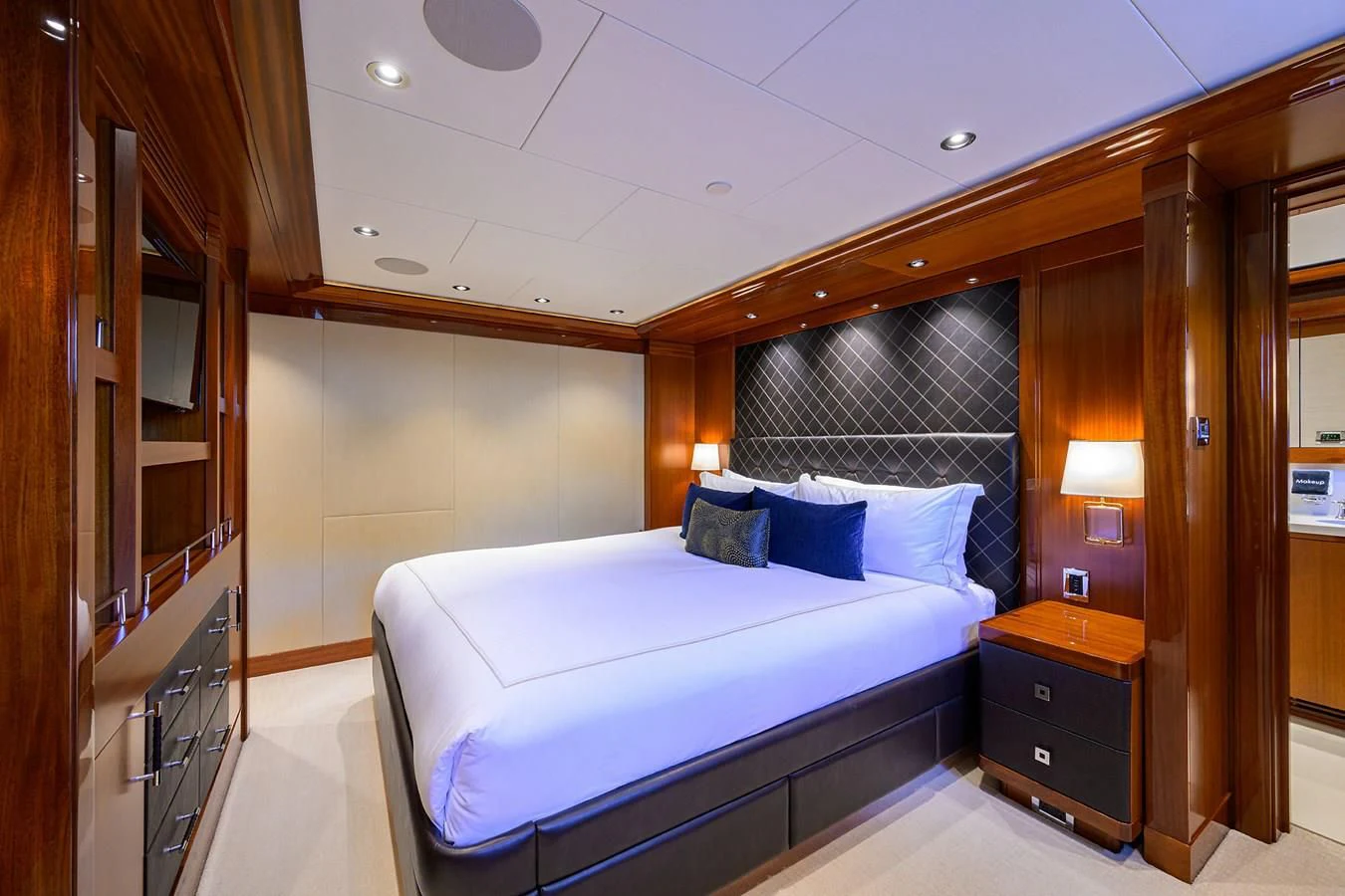 a bed in a room aboard NEENAH Yacht for Charter