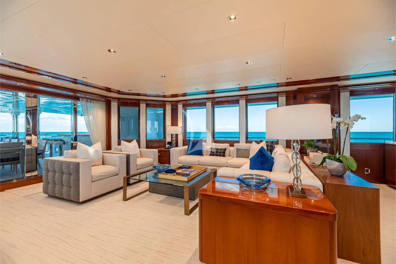 a living room with a large window aboard NEENAH Yacht for Charter