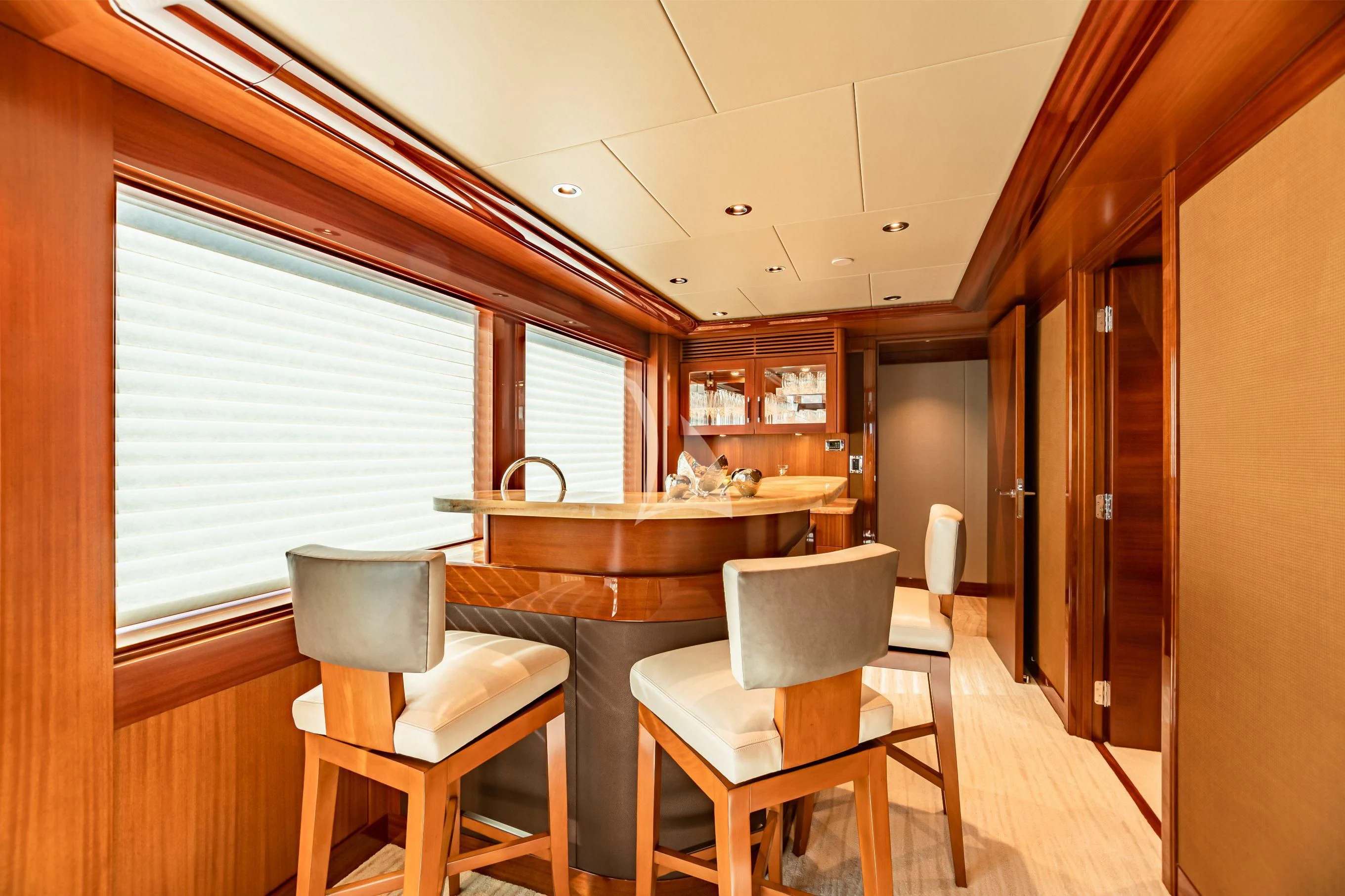 a dining room with a table and chairs aboard NEENAH Yacht for Charter