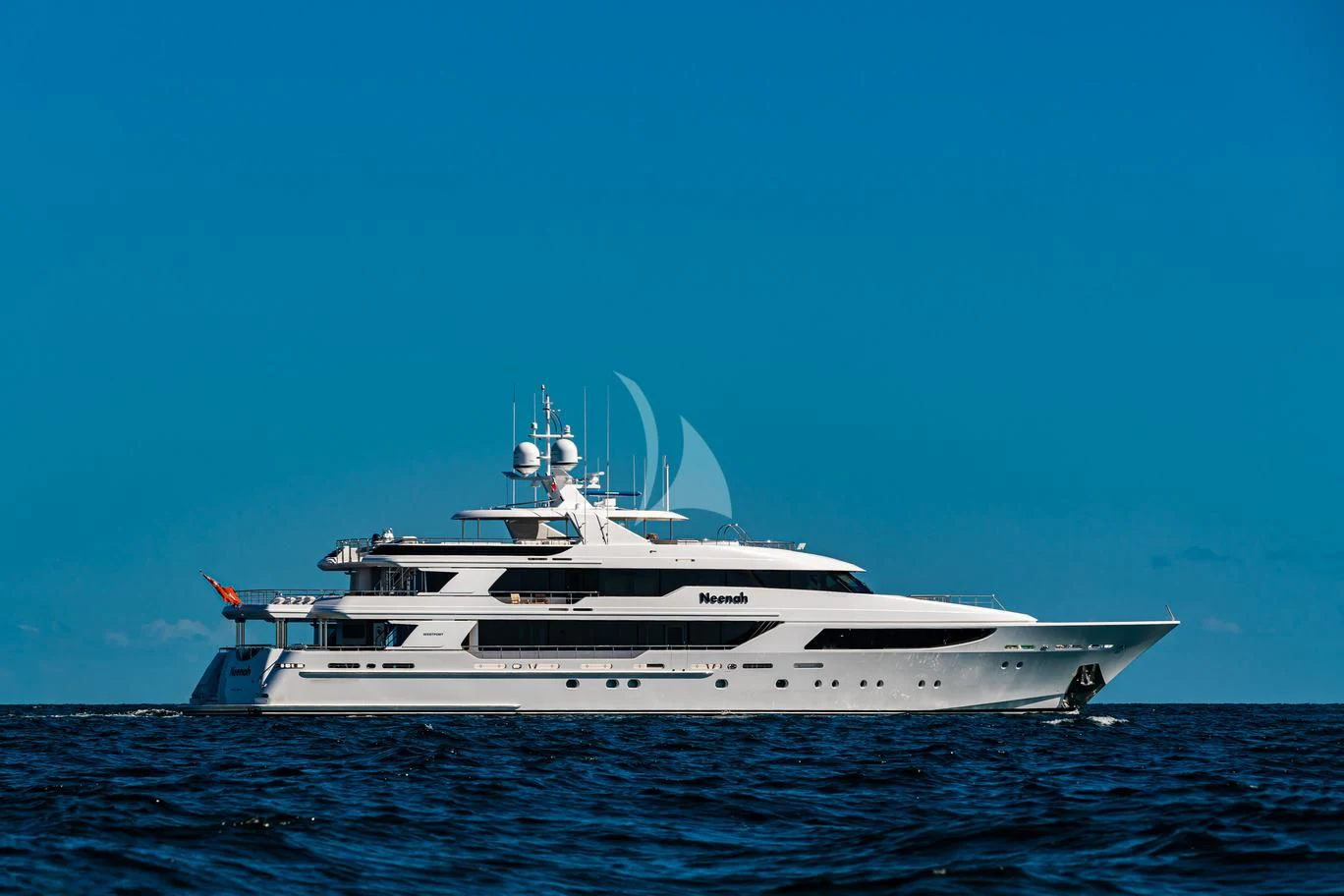 a white yacht in the water aboard NEENAH Yacht for Charter