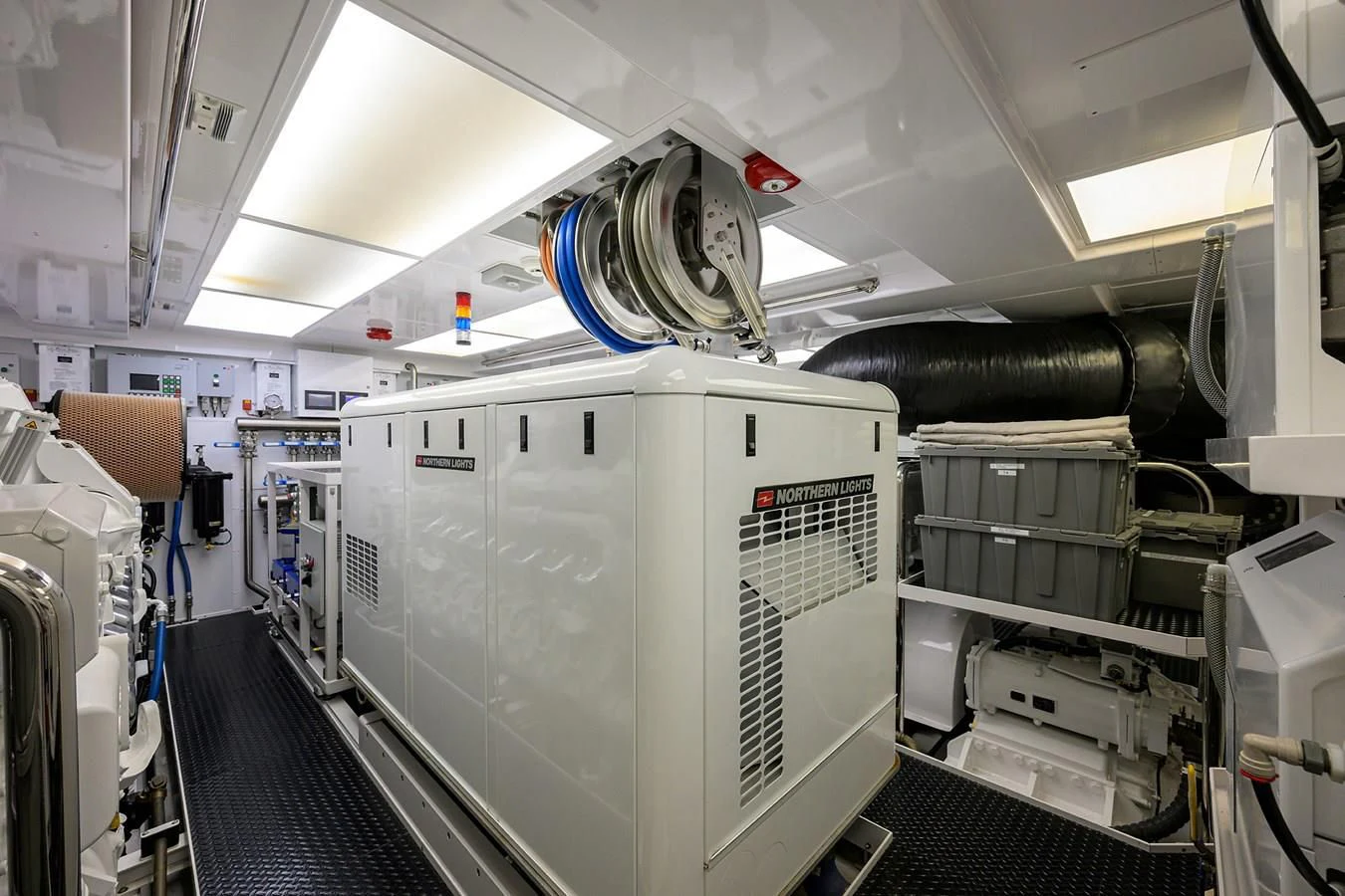 a large machine in a room aboard NEENAH Yacht for Charter
