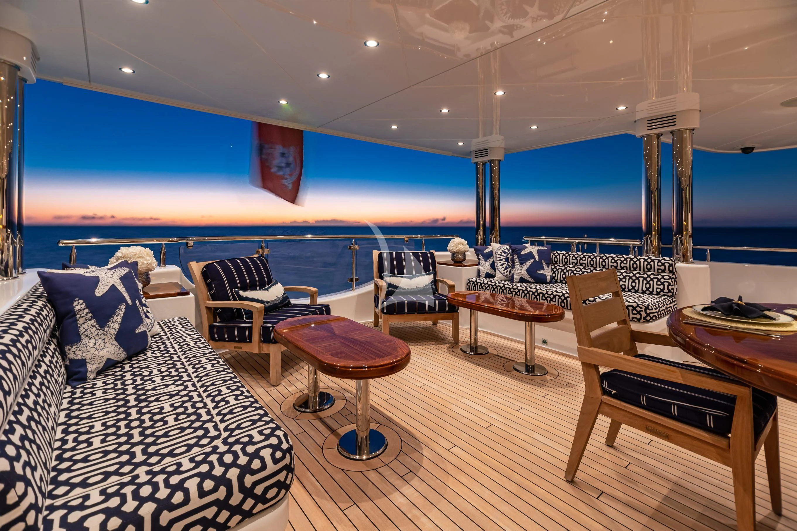 a room with a table and chairs aboard NEENAH Yacht for Charter