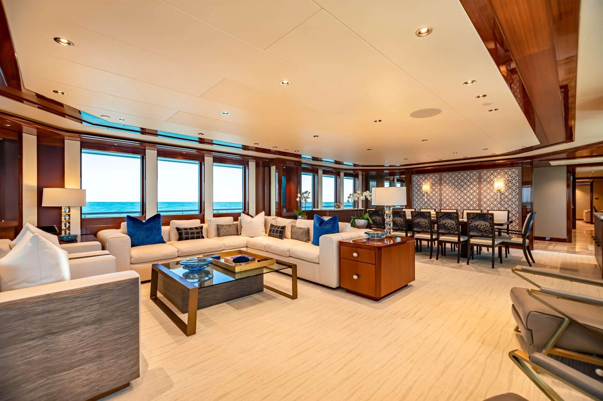 a living room with a large window aboard NEENAH Yacht for Charter