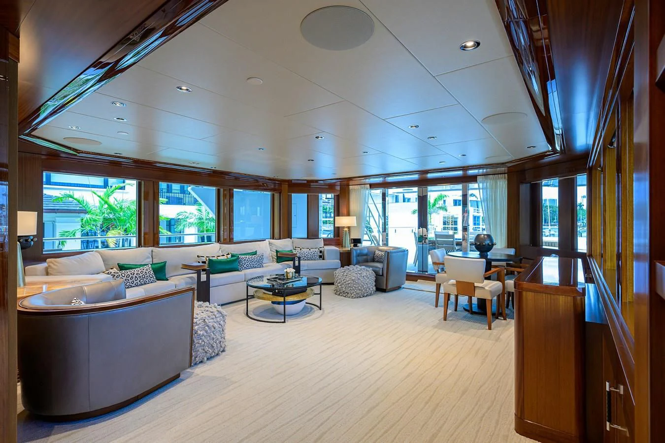 a living room with a large window aboard NEENAH Yacht for Charter