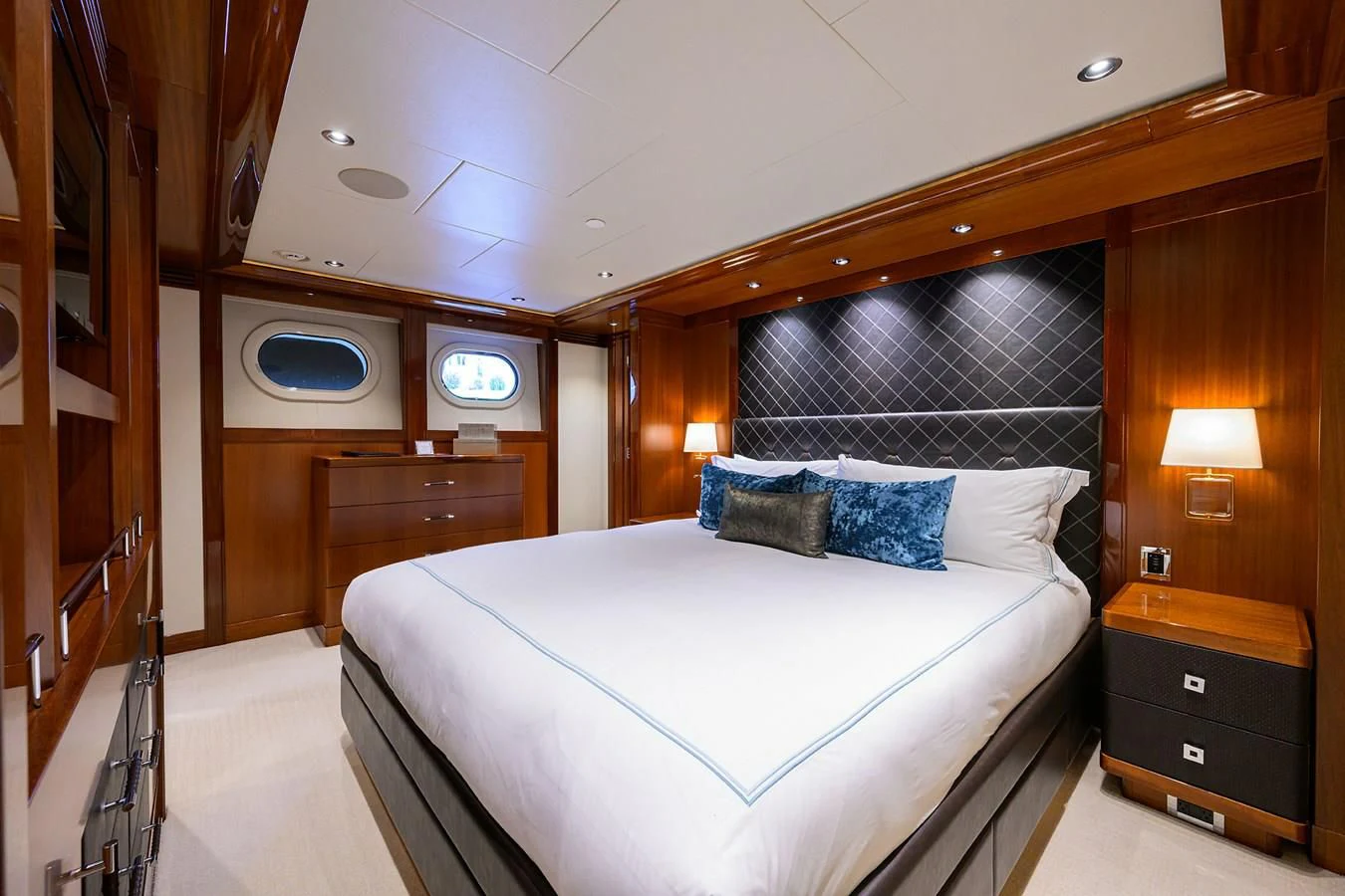 a bed in a room aboard NEENAH Yacht for Charter