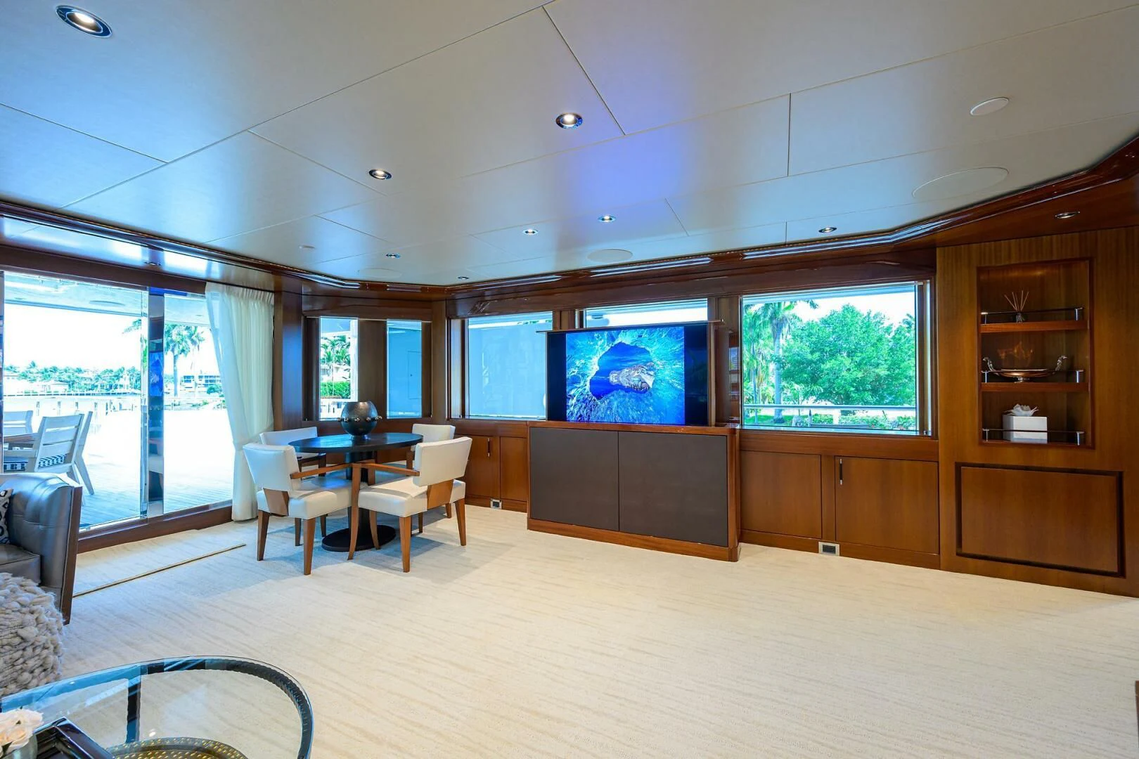 a room with a large screen aboard NEENAH Yacht for Charter