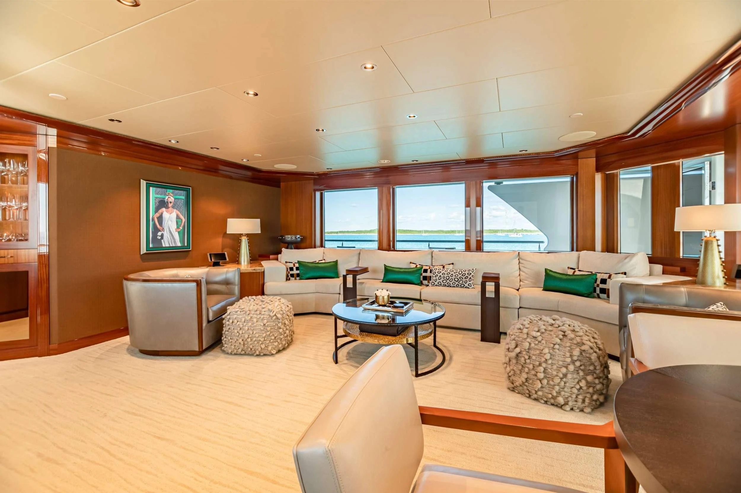 a living room with a large window aboard NEENAH Yacht for Charter