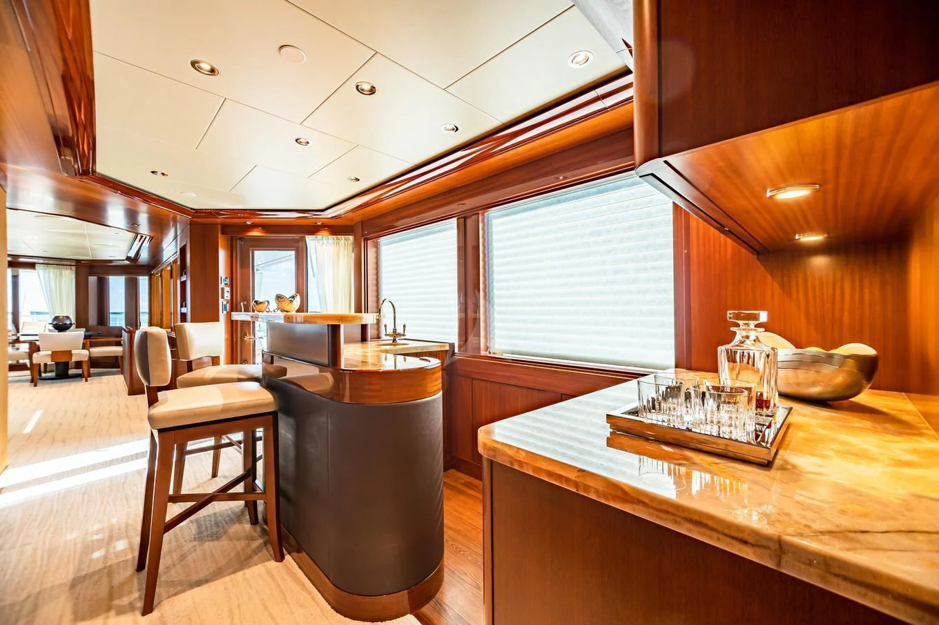 a kitchen with a table and chairs aboard NEENAH Yacht for Charter