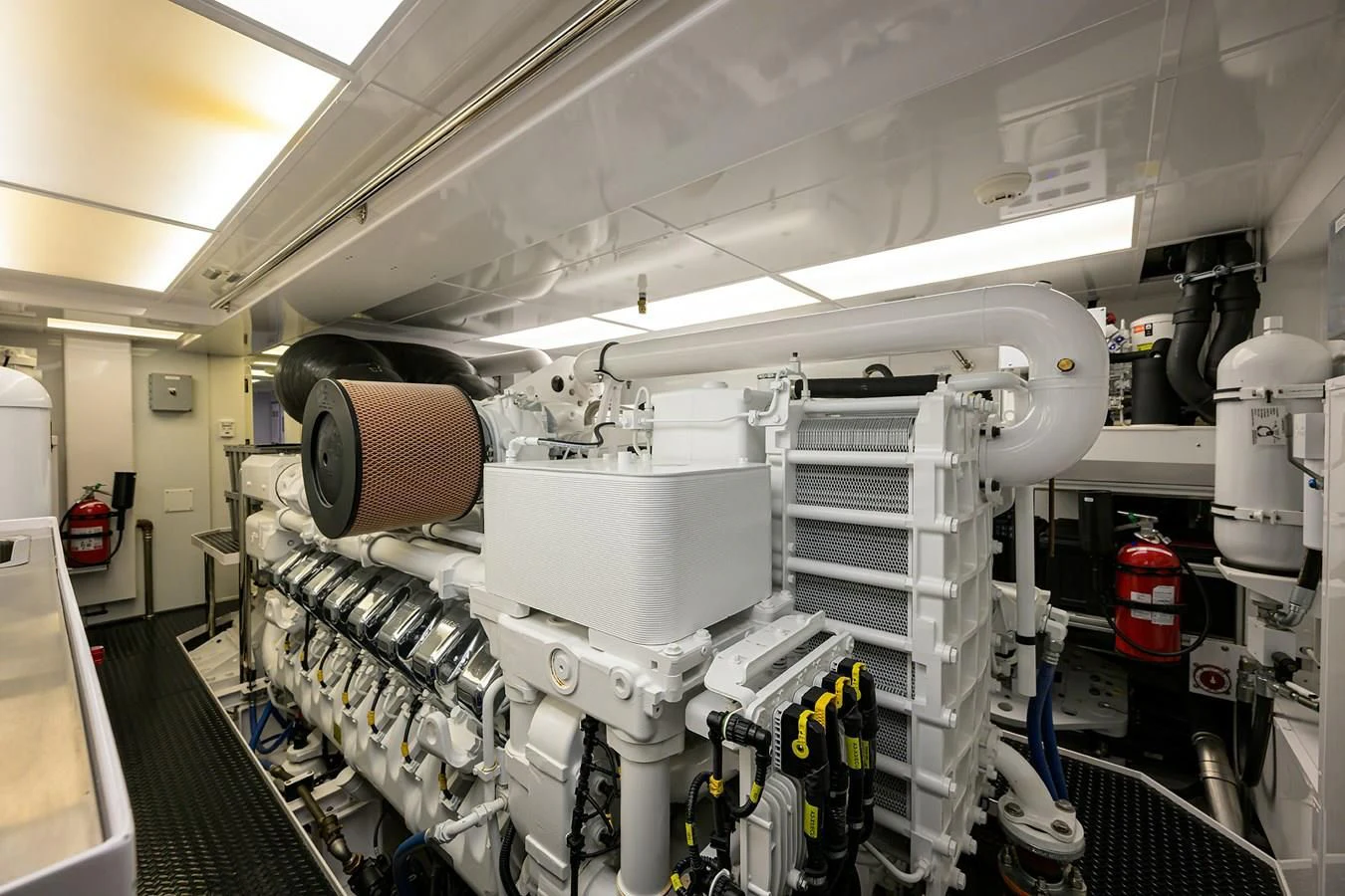 a large machine in a room aboard NEENAH Yacht for Charter