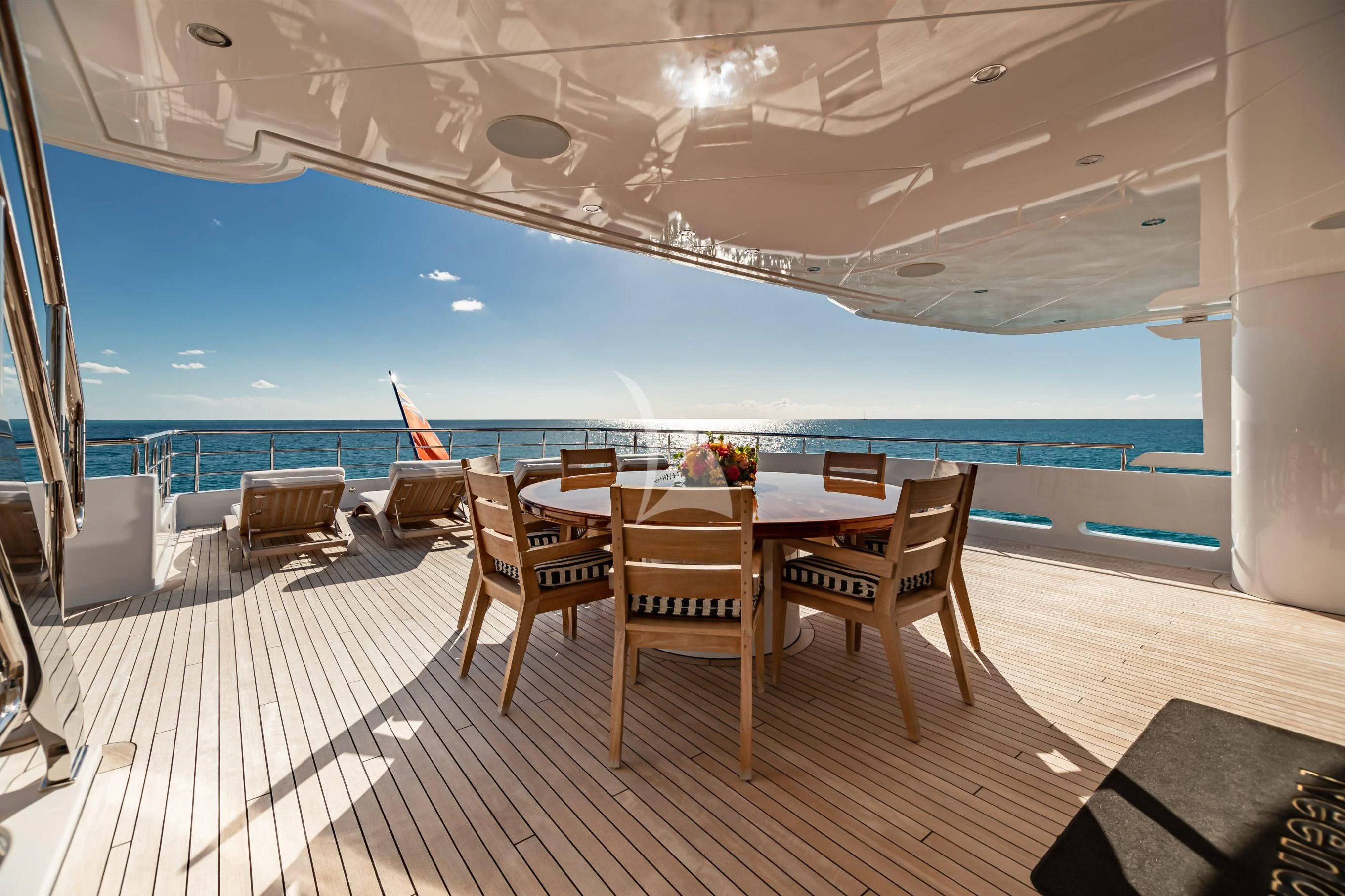 a room with a table and chairs aboard NEENAH Yacht for Charter