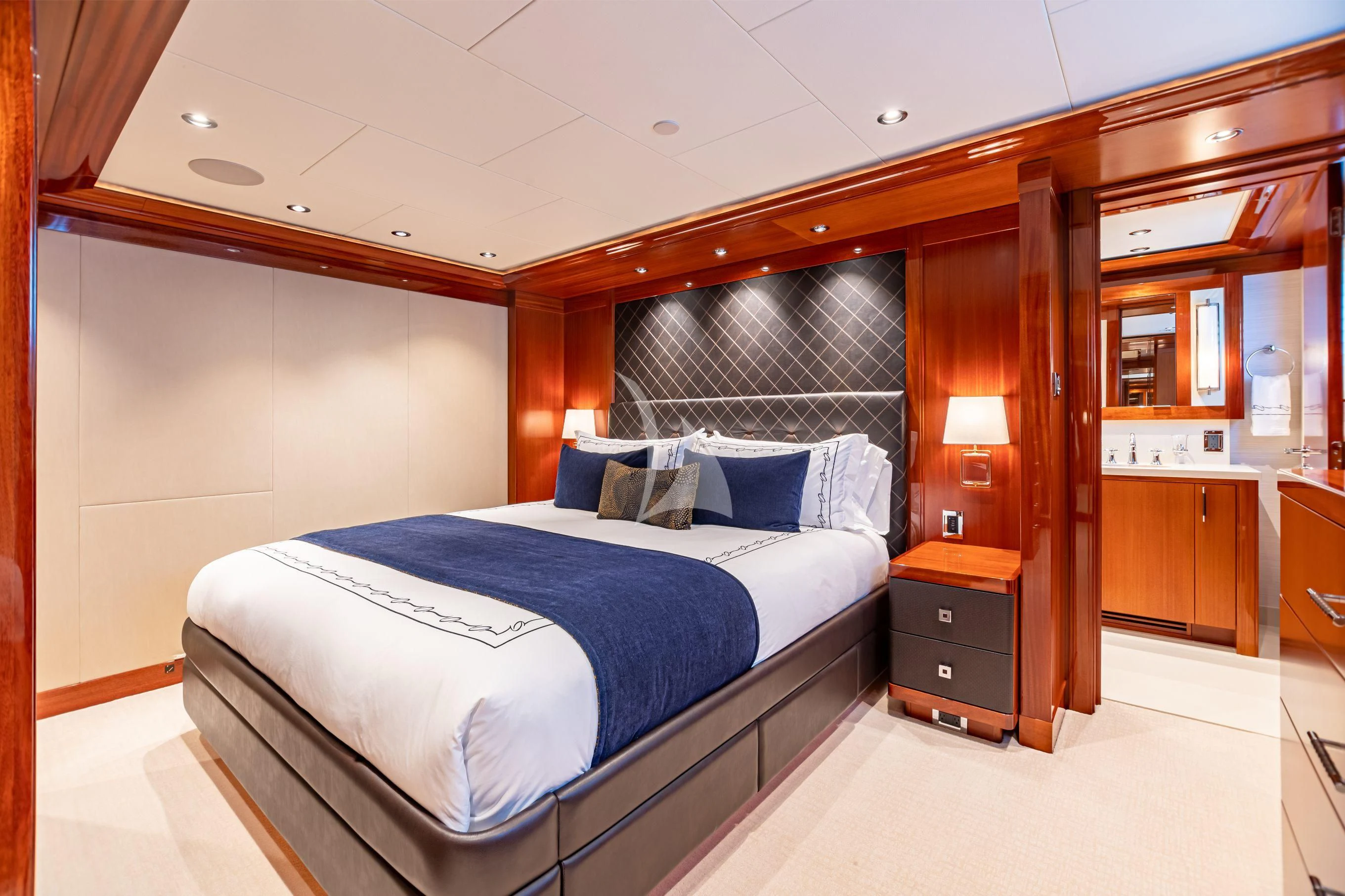 a bed in a room aboard NEENAH Yacht for Charter