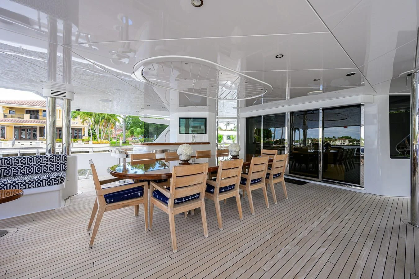 a room with tables and chairs aboard NEENAH Yacht for Charter