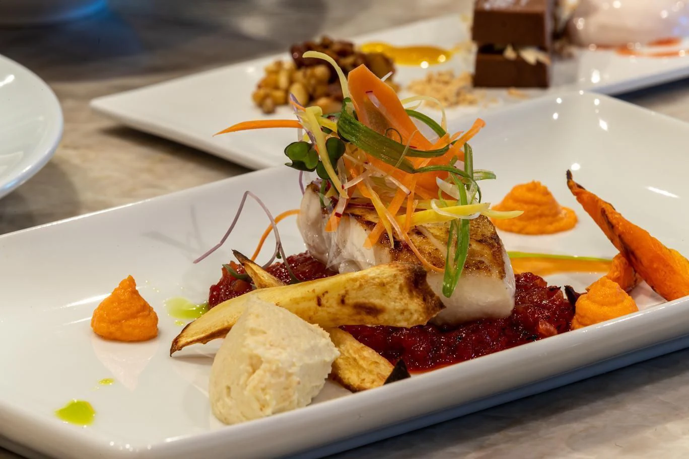 a plate of food aboard NEENAH Yacht for Charter
