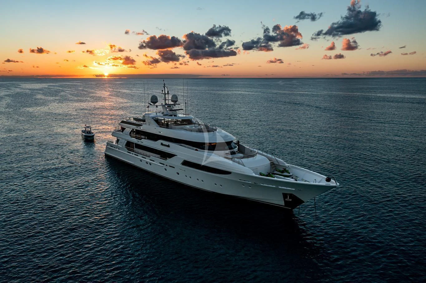 a white yacht in the water aboard NEENAH Yacht for Charter