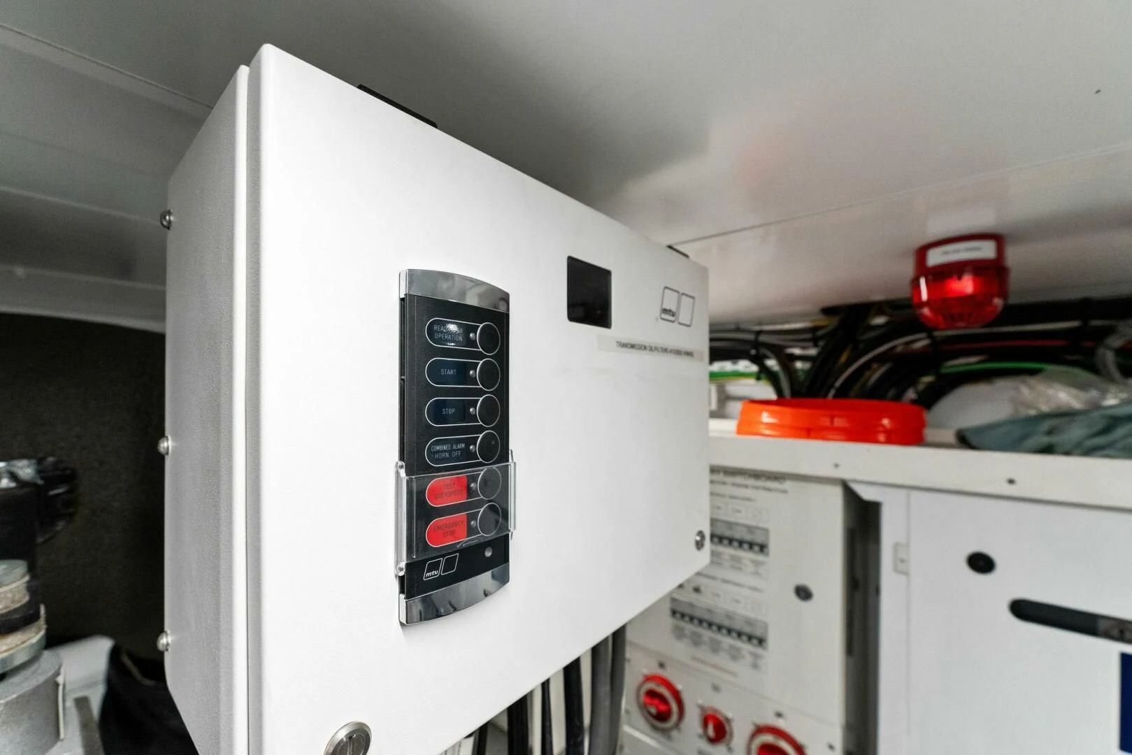 a white machine with a black control panel aboard GATSBY Yacht for Charter