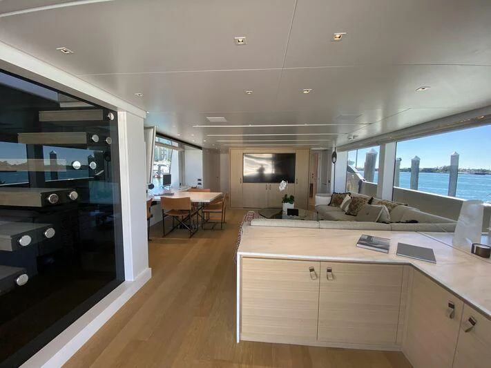 a large kitchen with a large window aboard GATSBY Yacht for Charter