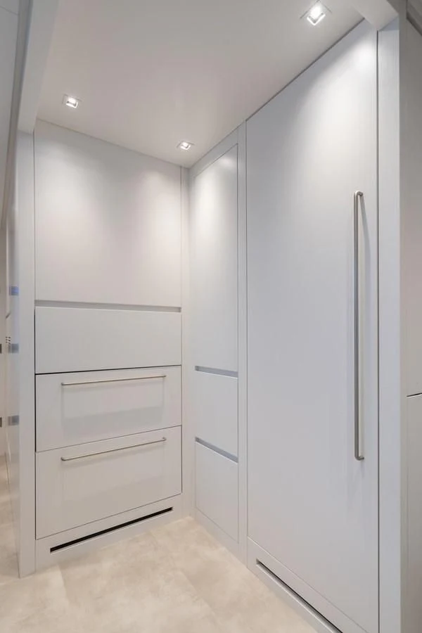 a room with white cabinets aboard GATSBY Yacht for Charter