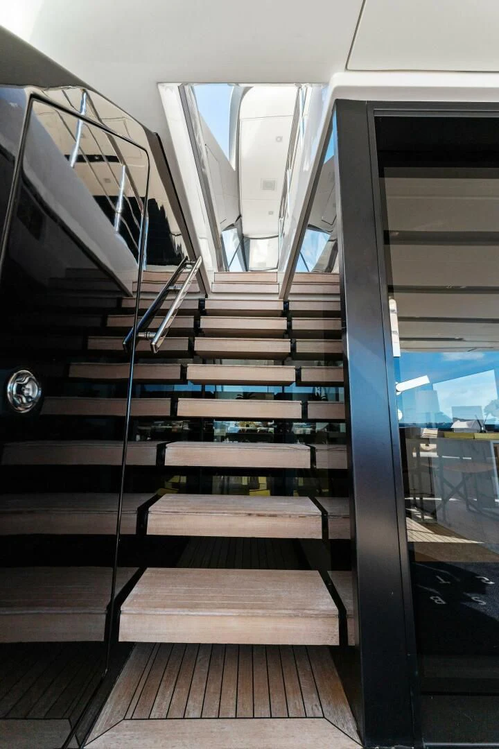 a staircase in a building aboard GATSBY Yacht for Charter