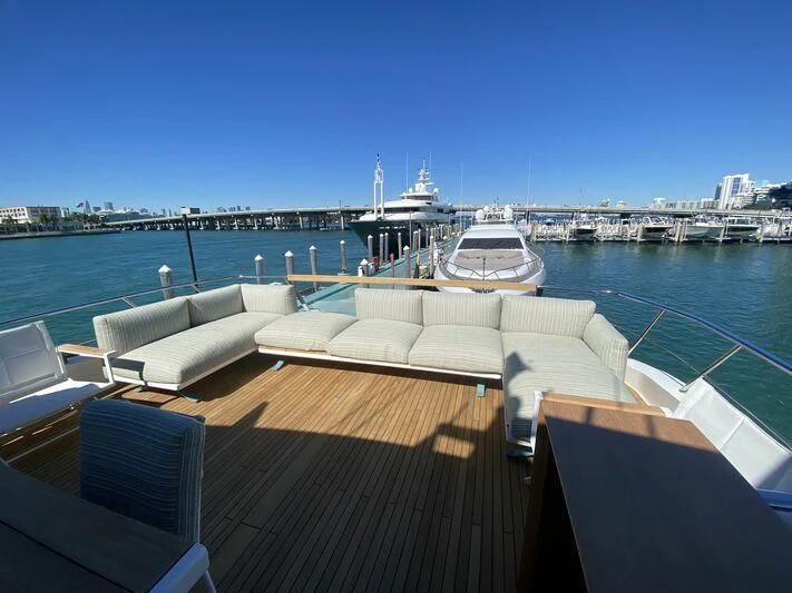 a deck with a boat on it aboard GATSBY Yacht for Charter