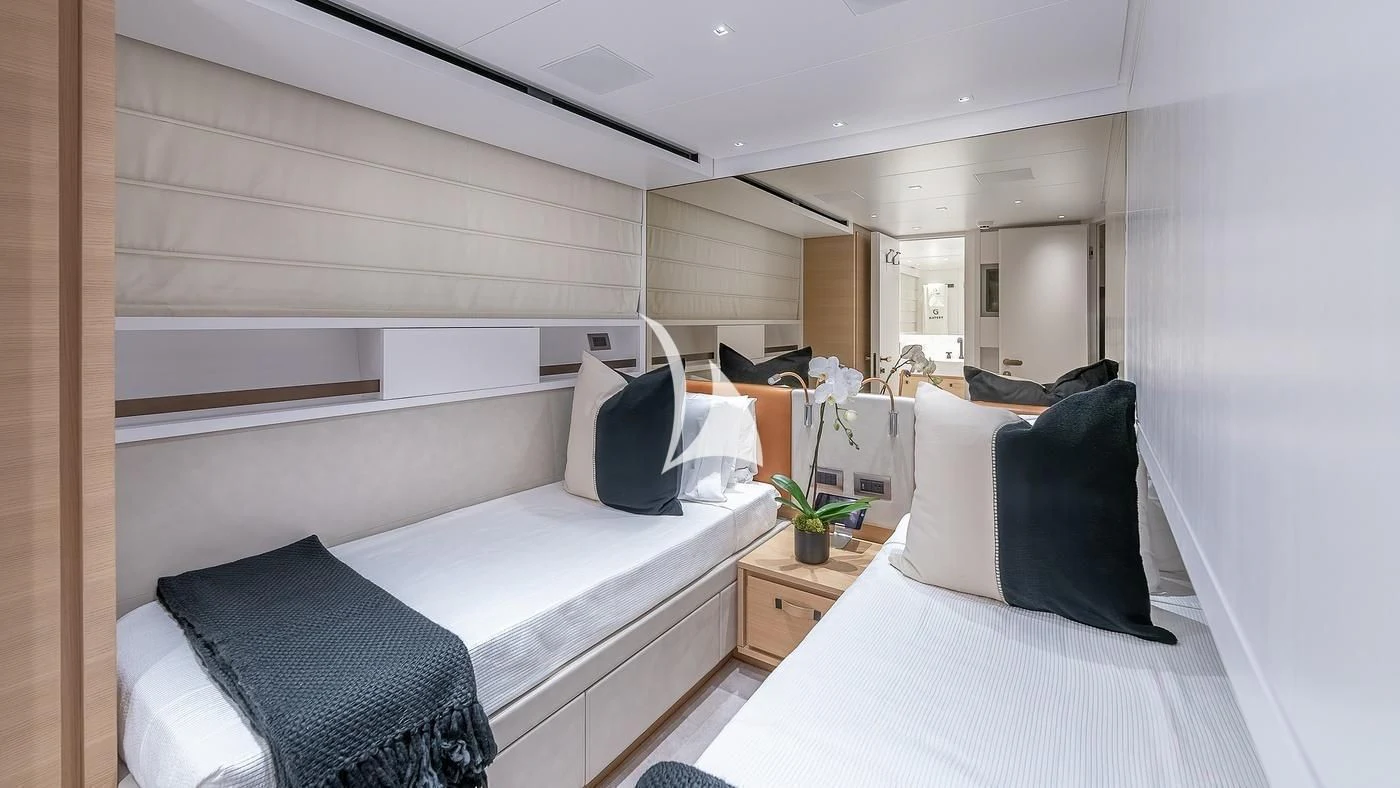 a room with two beds aboard GATSBY Yacht for Charter