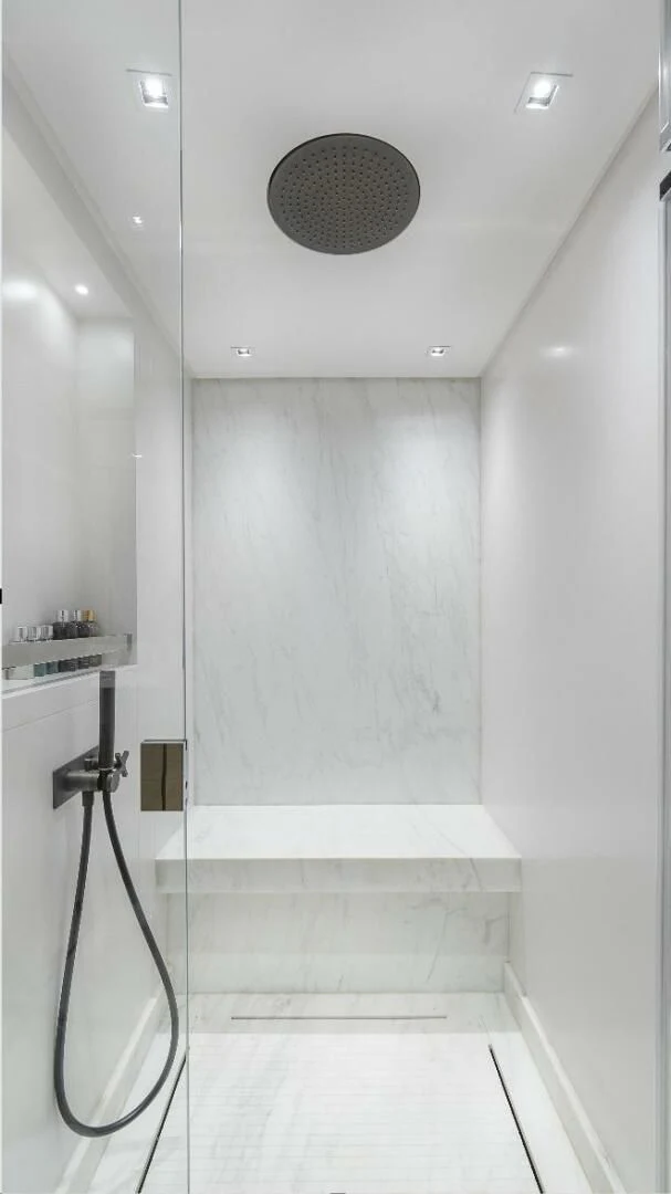 a shower unit in a bathroom aboard GATSBY Yacht for Charter